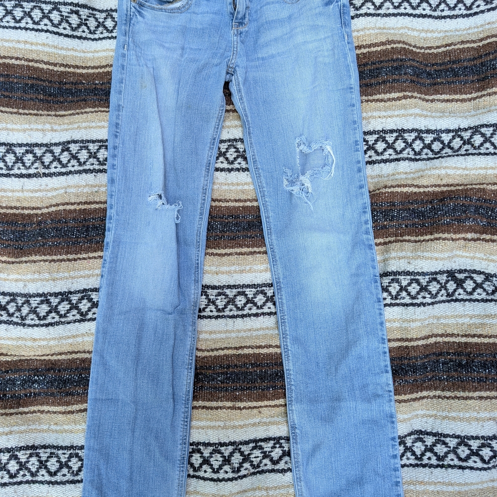 Women's Light Blue Distressed Jeans